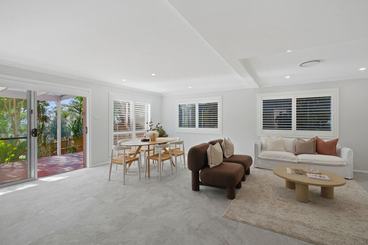 Dining and living flowing to the timber deck